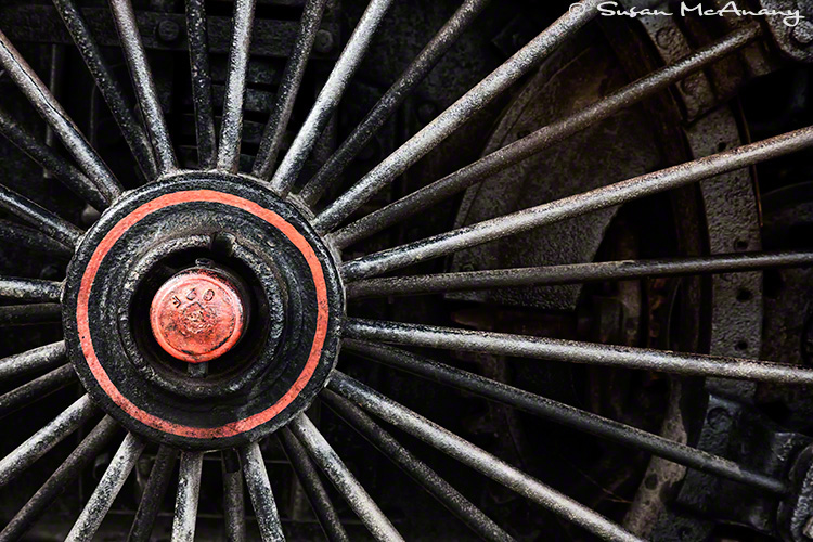 Close up of train wheel.